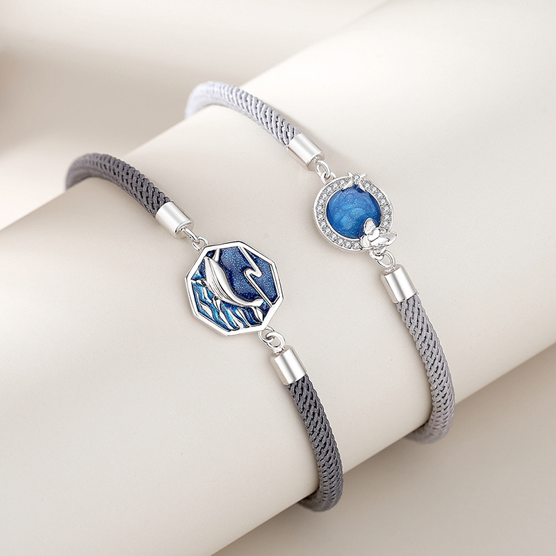 A Pair Of Whale Lovers Bracelets In Sterling Silver