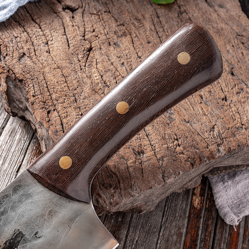 Cutting Meat With Carbon Steel Butcher Knife