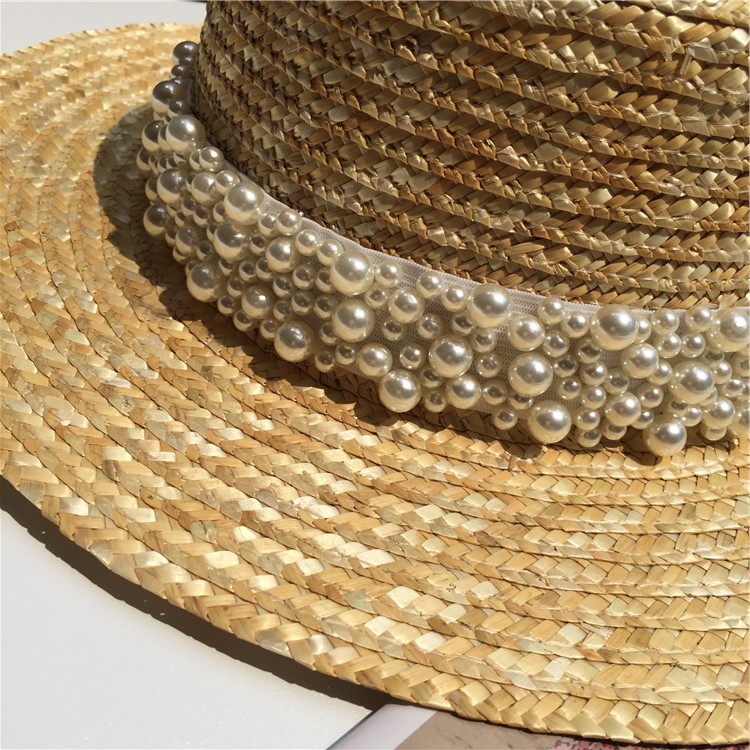 Title 4, Female pearl decorated straw hat