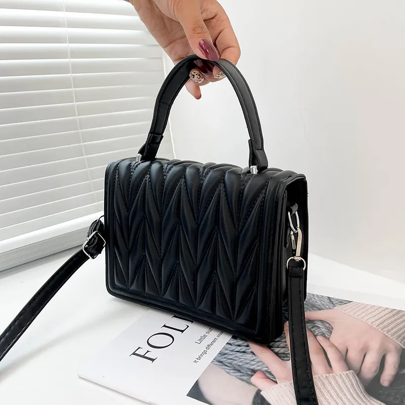 Soft Embroidered Thread Color Hand-held Messenger Bag - Black