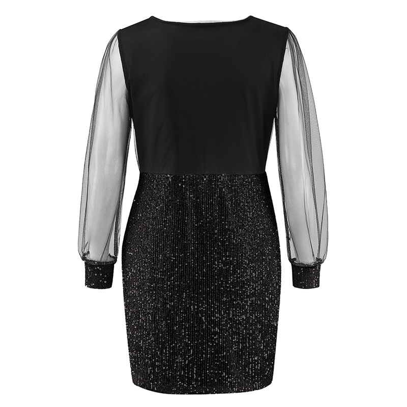 تنورة ضيقة أنيقة بمزينات الترتر وفتحة رقبة V عميقة مع تفاصيل التوصيل