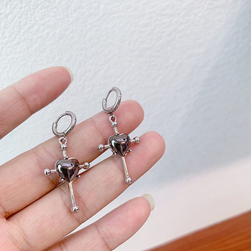 Title 2, Metal Gray Love Ear Buckle Earrings offer a sty...