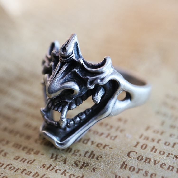 Title 4, Thai Silver Japanese Frosted Skull Ring, a bold...