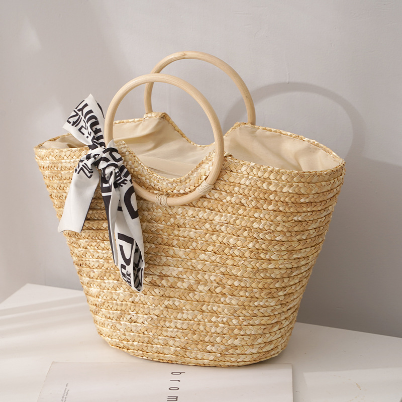 Rattan handle with silk scarf