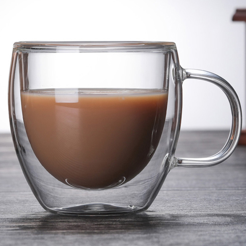 Double-walled borosilicate glass coffee cup with handle.