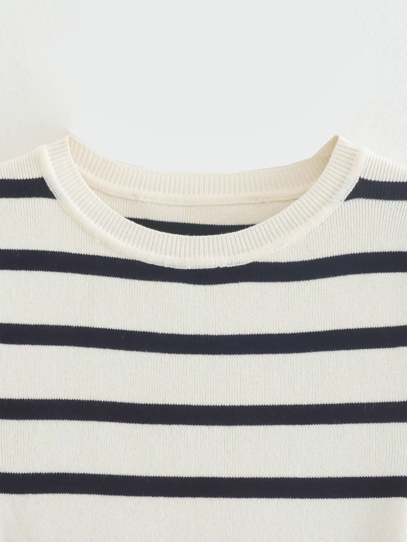 Title 8, Two-color Short Knitted Top with Slim Striped D...