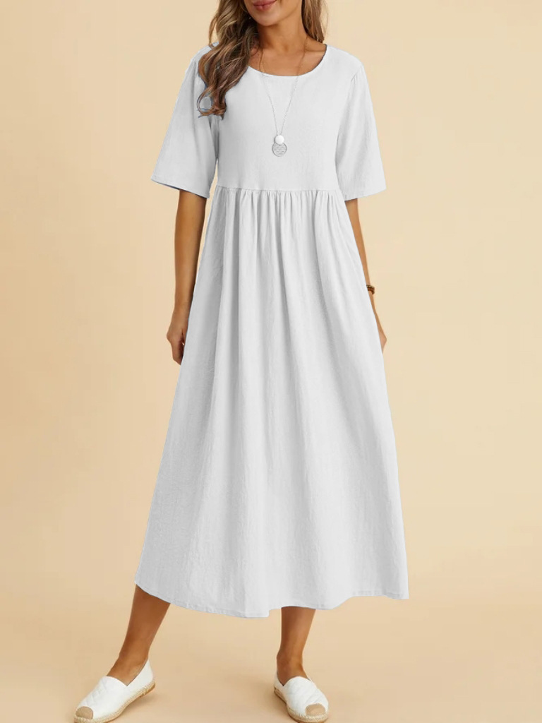 Cotton linen midi dress in peacock blue, lifestyle styling photo