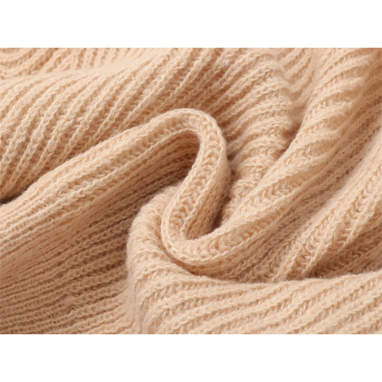 Wear A Slimming Short Sweater Over Long Sleeves