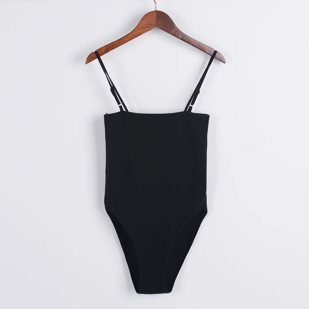 Title 1, Ladies Flat Sling Bodysuit, providing a comfort...