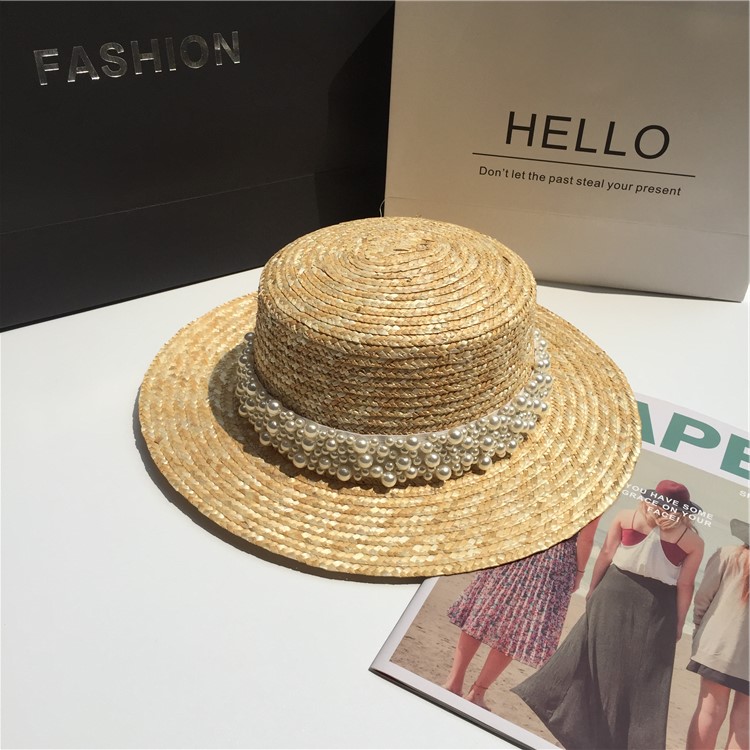 Title 1, Female pearl decorated straw hat