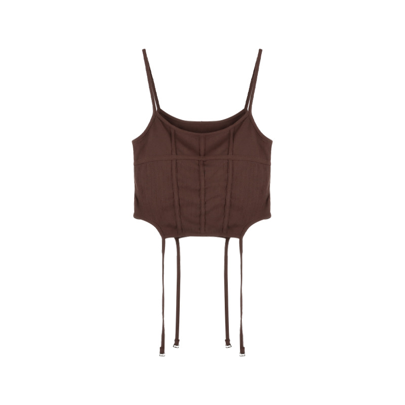 A Woman Wearing A Suspender Vest With A Chest Pad.