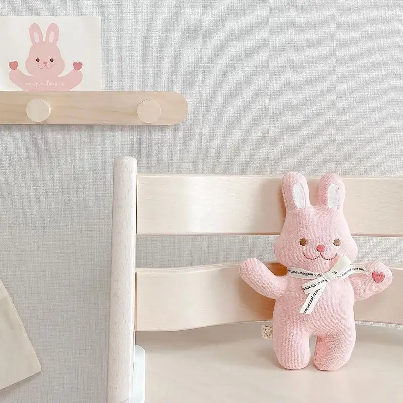 The Palm Of The Hand Presses The Heart To Make A Sound And The Children's Comforting Doll