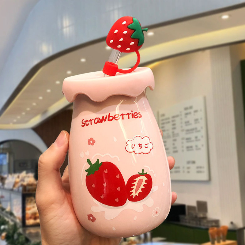 Sake bottle plus strawberry