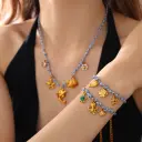 Blue Rope Braided Ocean-themed Pendant Set, Featuring Starfish, Dolphins, And Sea Turtles, Multi-dangling Necklace And Bracelet. view 13