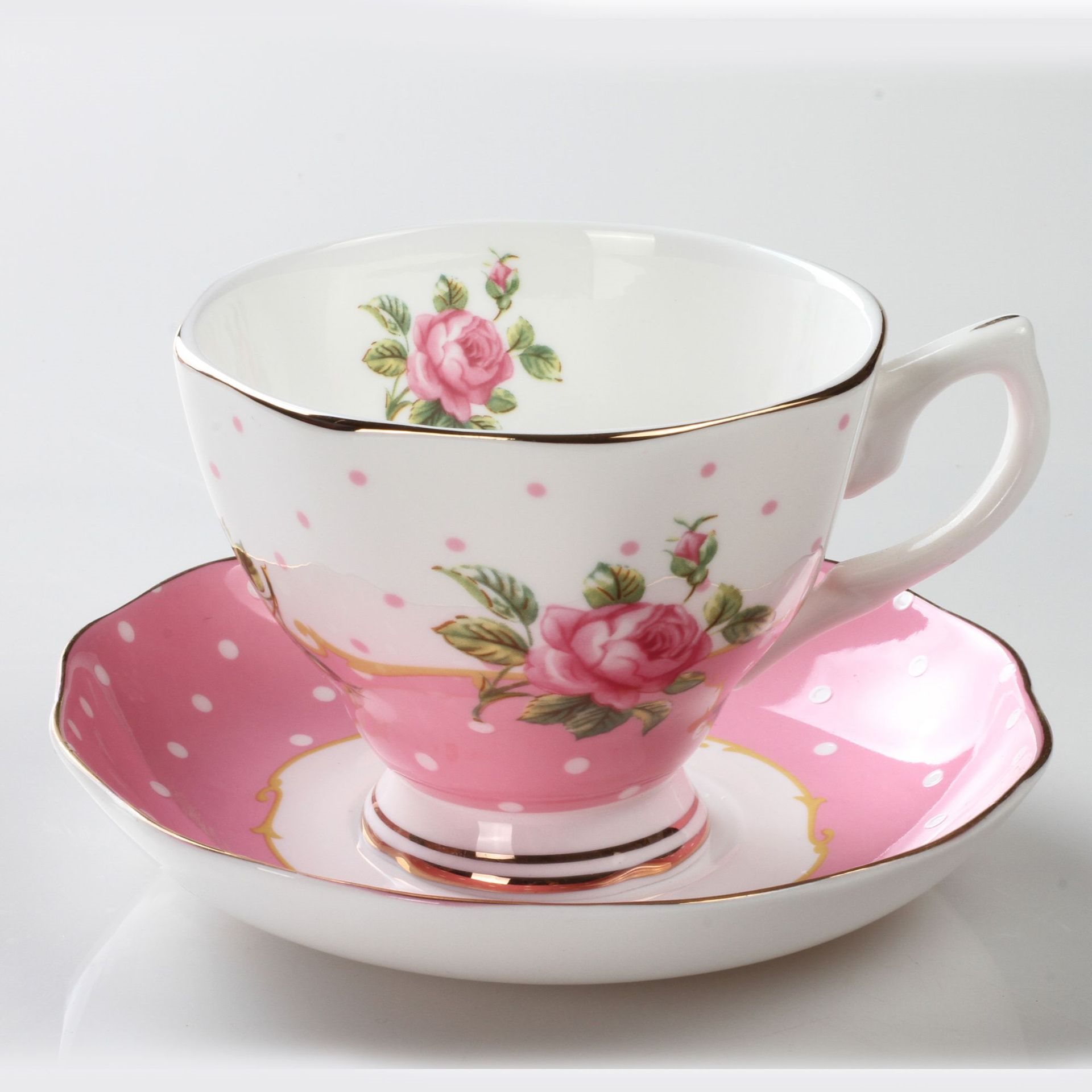 Polka dot pink rose cup and sa