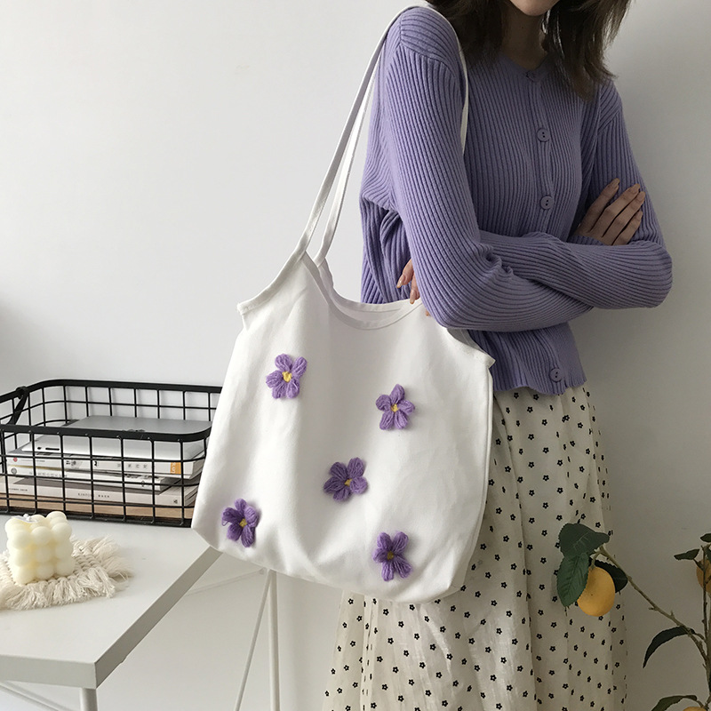 White bag purple flower