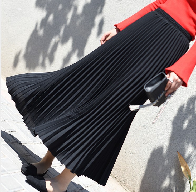 Title 13, Solid color pleated skirt offers effortless sty...