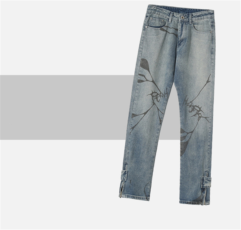 Jeans With Printed Buttons And Zipper Cuffs