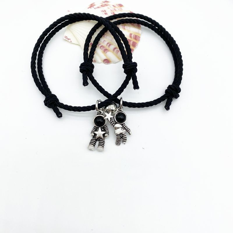 A Pair Of Small Rubber Bands On A Pair Of Attractive Bracelets For Boyfriend