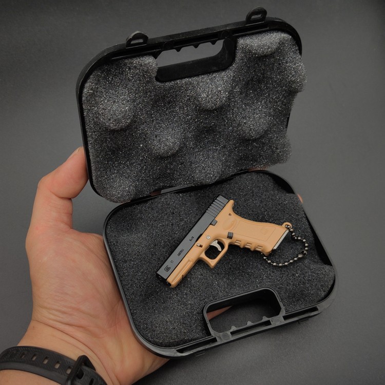 Rubber band gun keychain special plastic suitcase