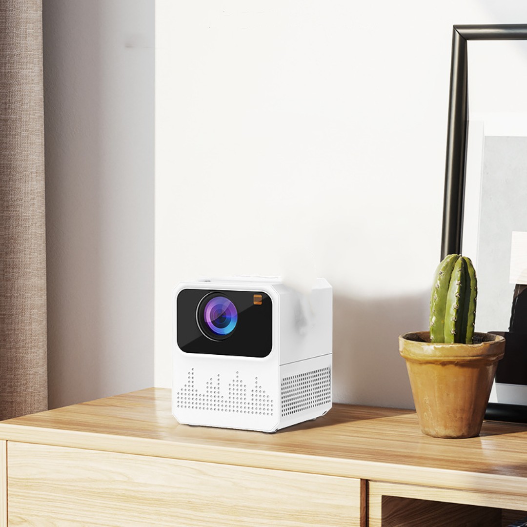 The Lumio Beam Mini projector on a concrete plinth in hard studio light