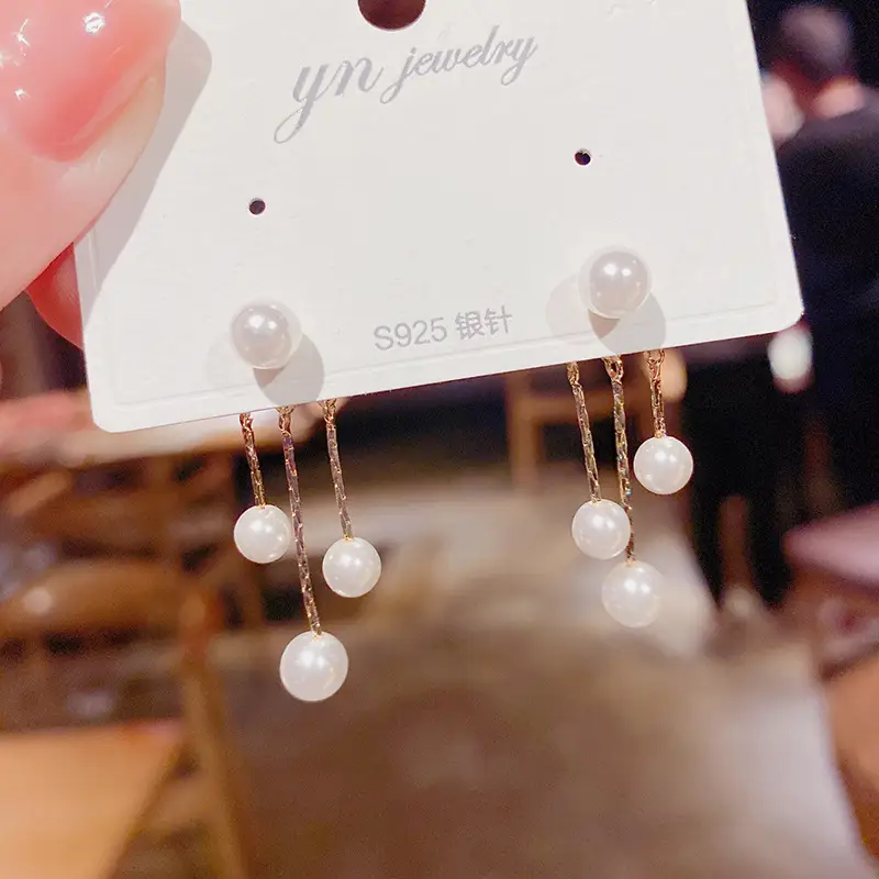 Fashion Pearl Tassels With Two Earrings