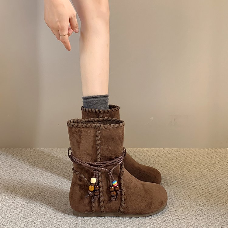 Women's vintage tassel ankle boots – full pair view showing slim-fit silhouette