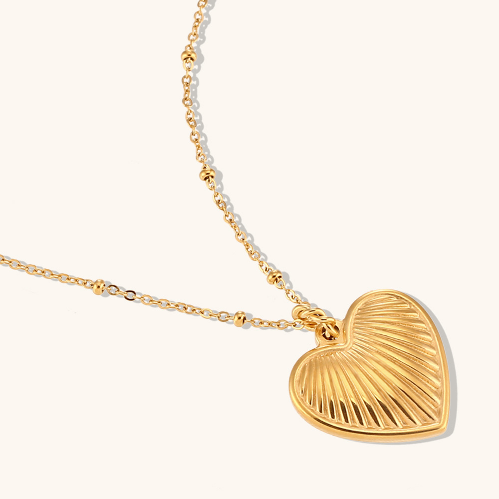 Title 3, Collana in oro 18K con pendente a cuore pesca a...