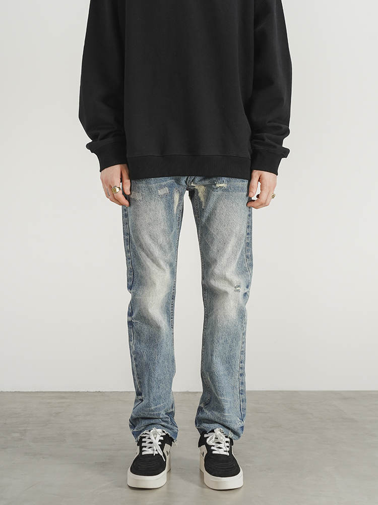 Distressed Washed Jeans With Fringe