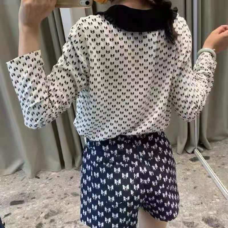 شورت نسائي نحيف بخصر عالي وأزرار بسحّاب