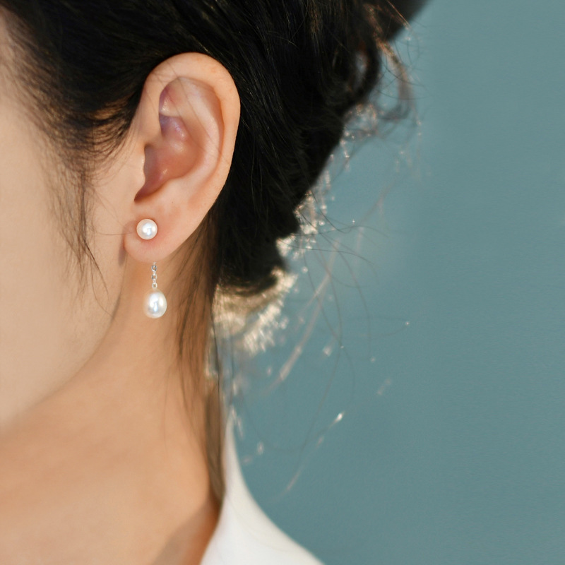 Freshwater Pearl Earrings Are Worn By Women For Two