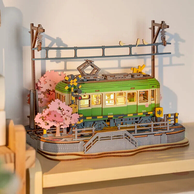 Sakura Journey 3D Puzzle Model Teens Gift - Kamakurakokomae station in front of Kamakura High School, the sakura train beckons you to a thrilling journey with your loved one. Be a tourist for a day as you leisurely roam the seaside where the windows are w