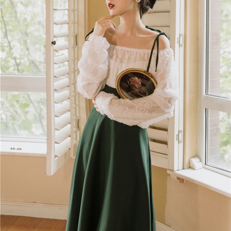 Clear long-sleeved white top with suspender skirt