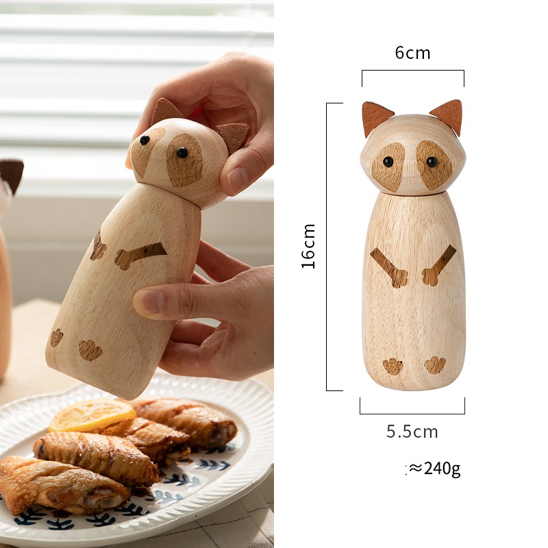 Hand operated old wooden grinding bottle