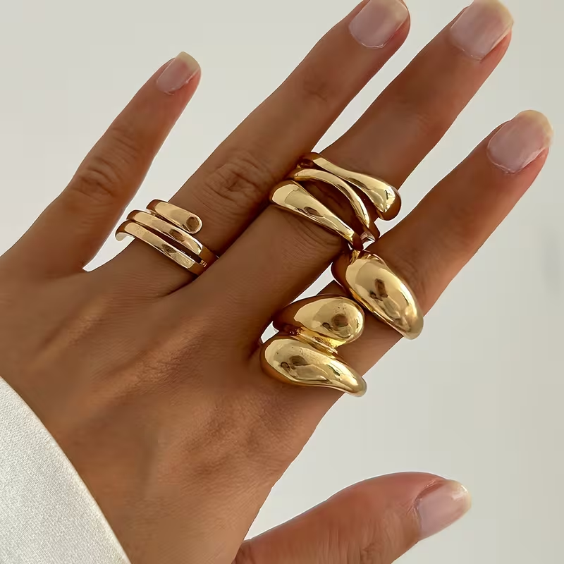 A Set Of 4 Elegant And Minimalist Golden Rings, Adjustable Open Rings For Women, Featuring A MultiLayer Spiral And Teardrop Geometric Design, Suitable For All Seasons