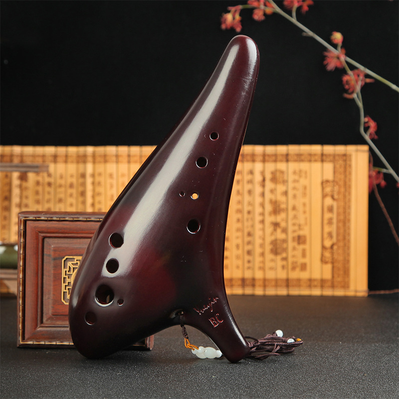 Title 2, 12 hole bass C key performance smoked ocarina