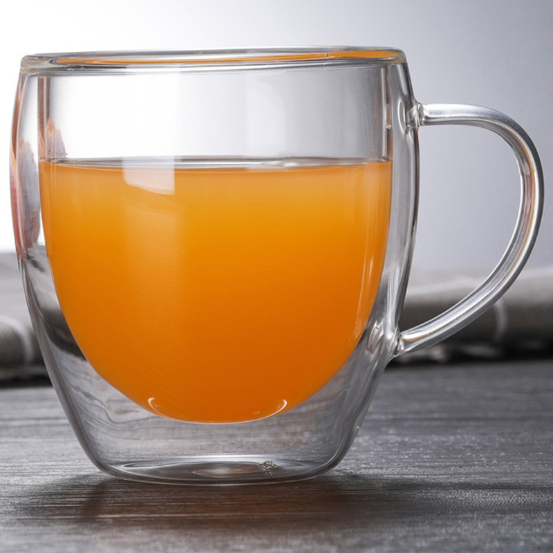 Double-walled borosilicate glass coffee cup with handle.