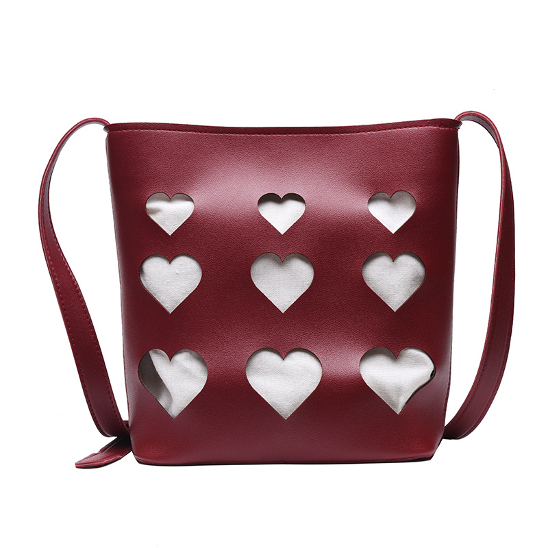 Title 21, Petit sac seau creux coeur pêche assorti