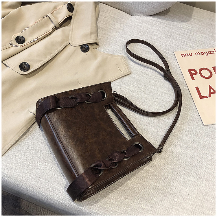 Title 4, Small square oilskin bag with silk scarf. Daily...