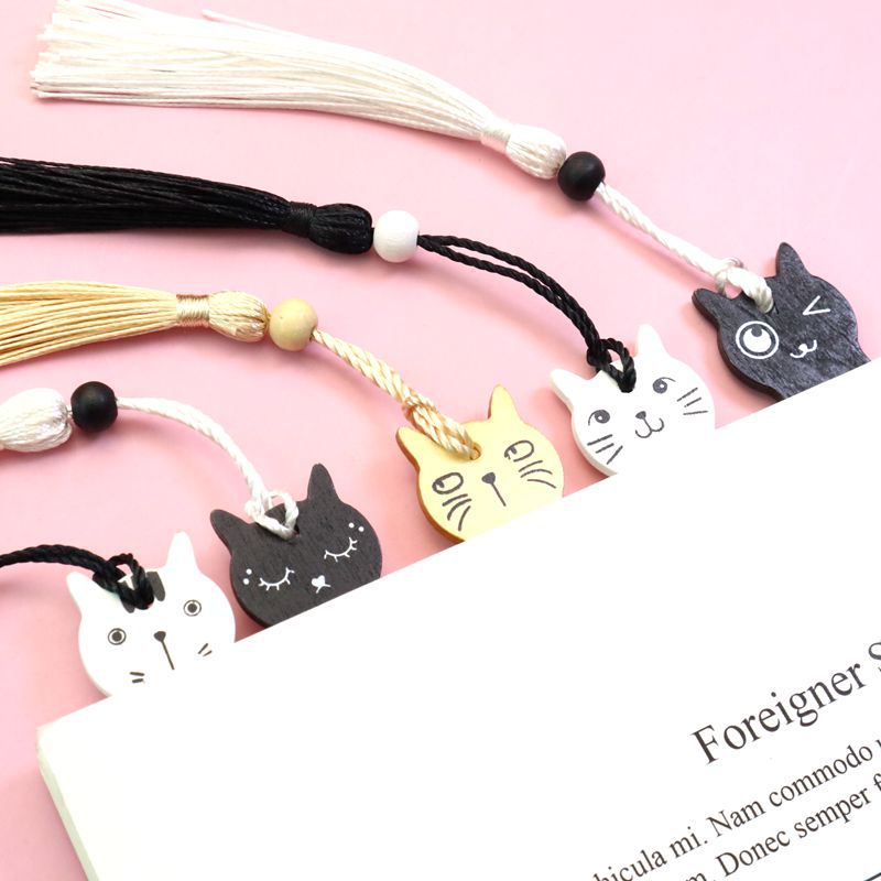 Wooden cat bookmark collection showing five unique designs