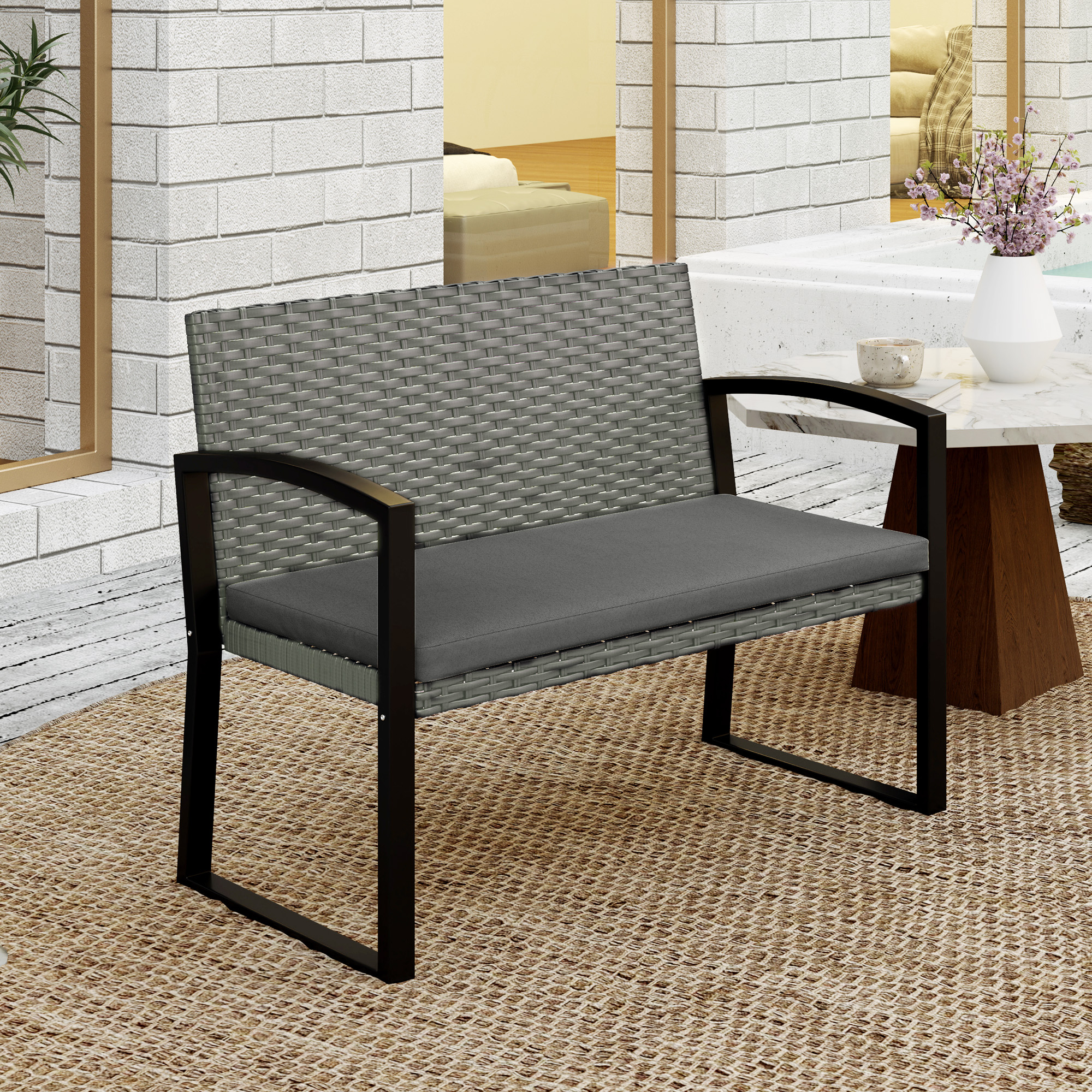 Double rattan garden bench