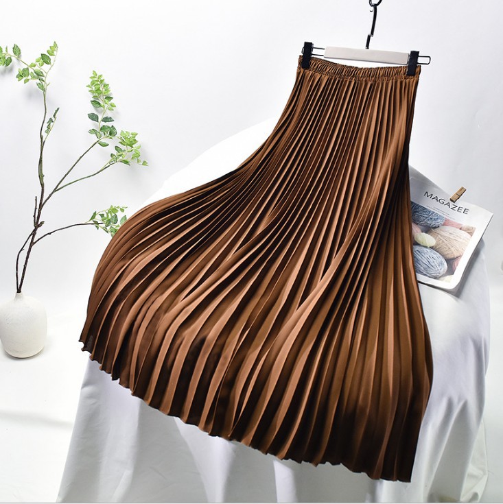 Title 11, Solid color pleated skirt offers effortless sty...