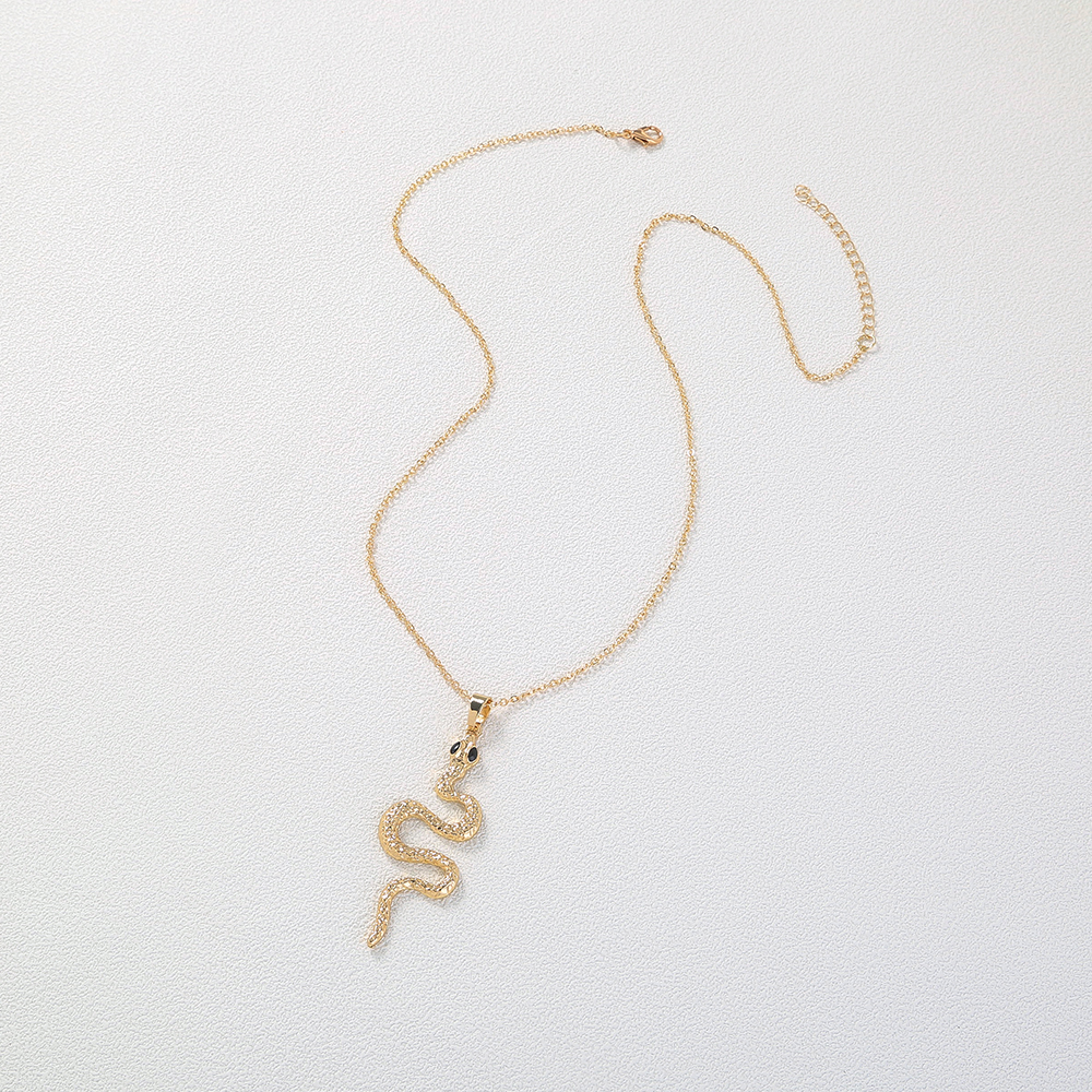 Individual animal necklace with Serpentine Zircon glasses