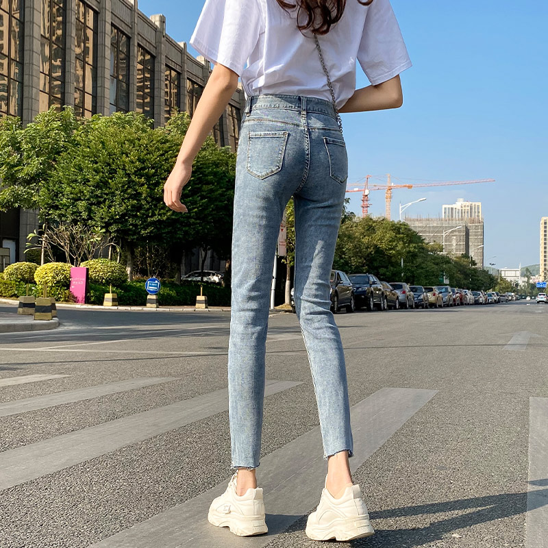 Light Blue Ripped Jeans Women's Thin And Tall Nine-point Pencil Feet Pants