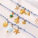 Blue Rope Braided Ocean-themed Pendant Set, Featuring Starfish, Dolphins, And Sea Turtles, Multi-dangling Necklace And Bracelet. view 2