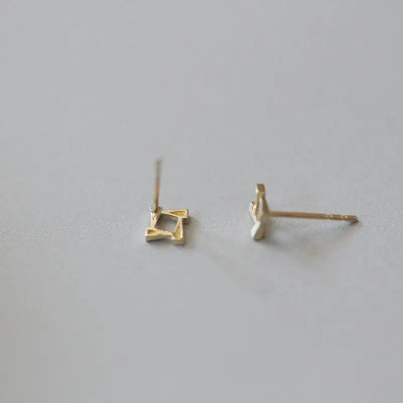 Female Geometric Rotating Triangle Cold Wind Graceful Earrings