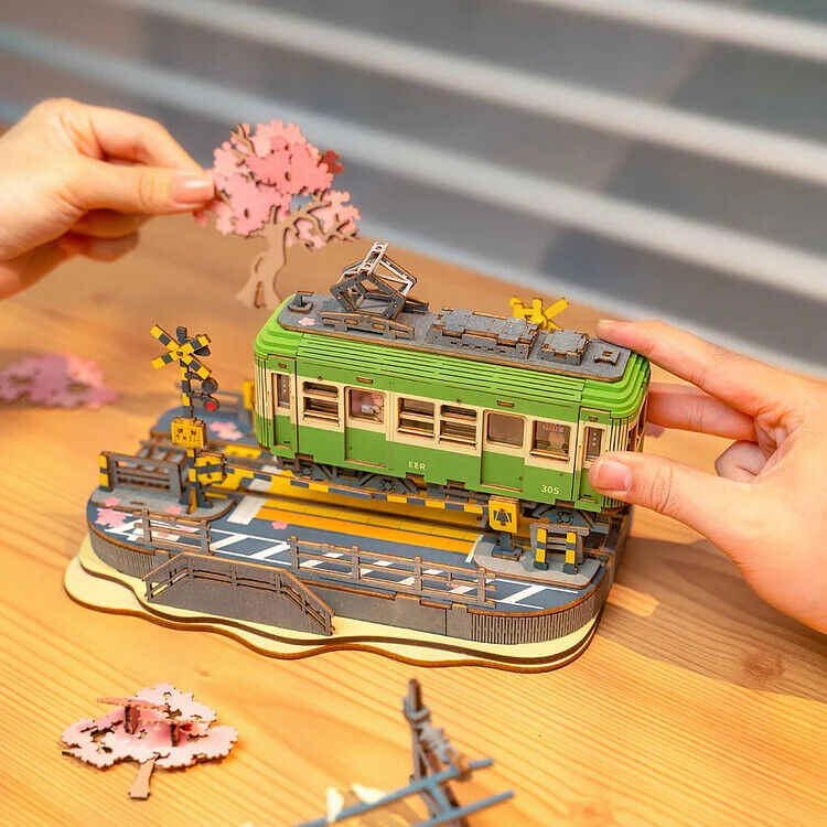 Sakura Journey 3D Puzzle Model Teens Gift - Kamakurakokomae station in front of Kamakura High School, the sakura train beckons you to a thrilling journey with your loved one. Be a tourist for a day as you leisurely roam the seaside where the windows are w