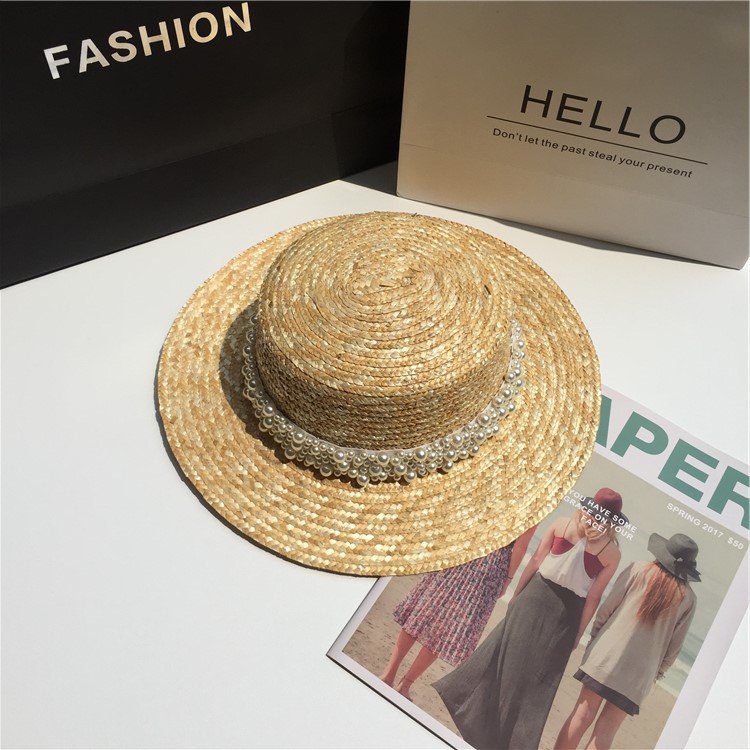 Title 2, Female pearl decorated straw hat