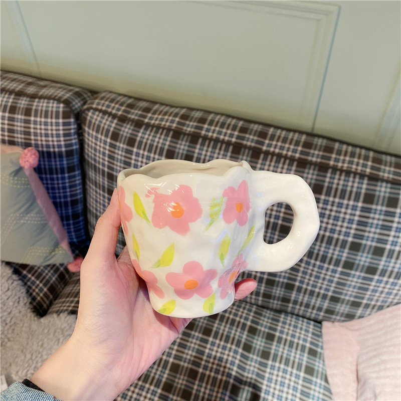 Hand squeezed pink flower mug