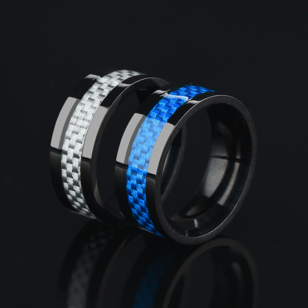 Title 4, Mens stainless steel and carbon fiber ring. Co...